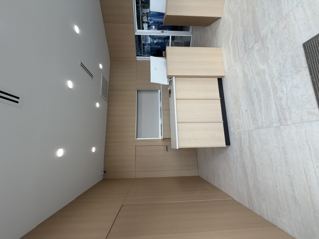 A second view of Pro Cleaners’ renovated interior and garment-care counter